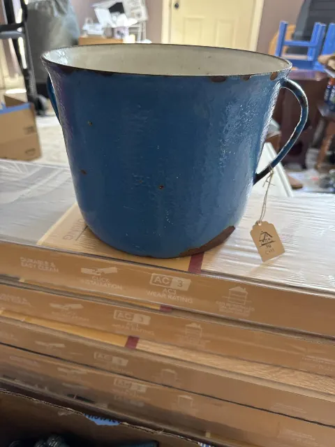 Blue enamelware pot
